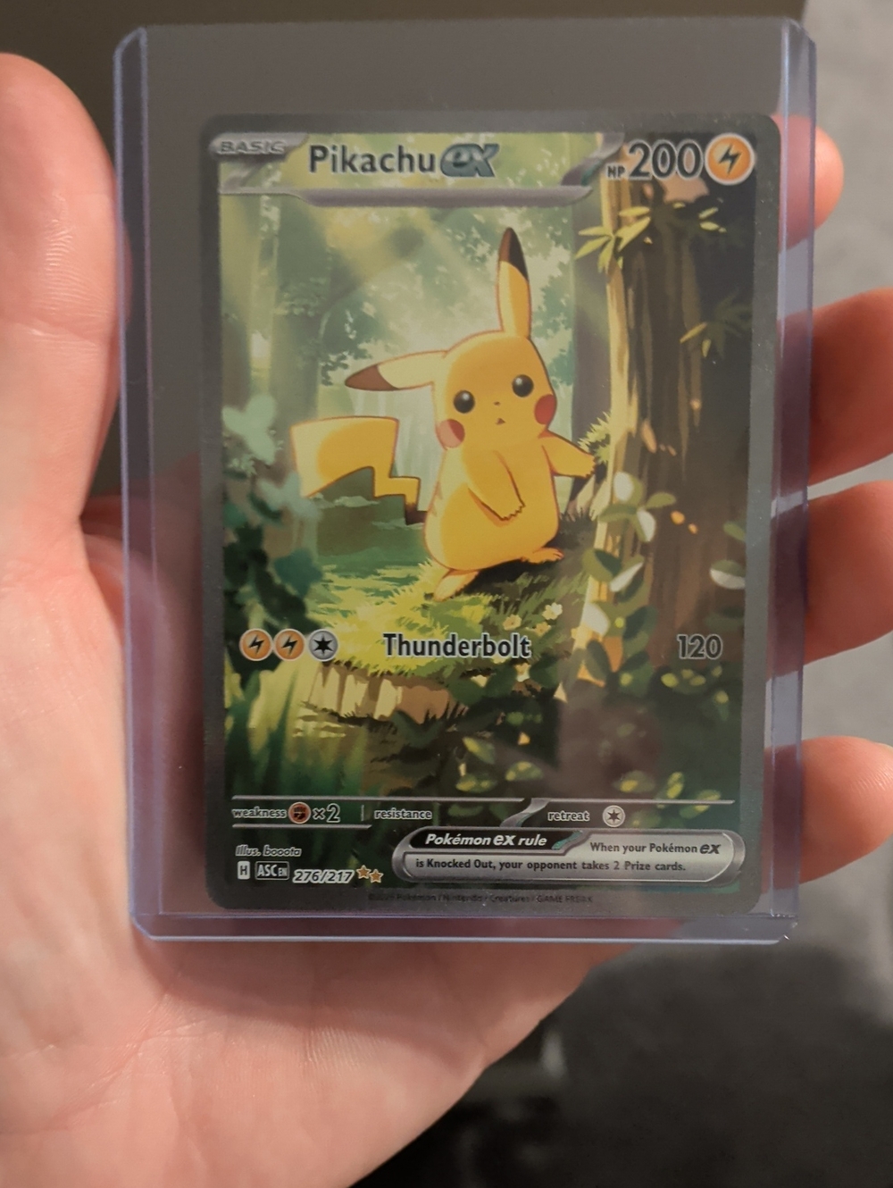 Pokemon Pikachu GX Card with Yellow and Green Artwork